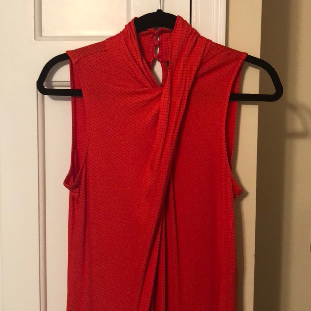 Sleeveless red and black blouse